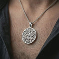 Load image into Gallery viewer, Polished silver Eye of Providence pendant necklace worn on the neck, shown against the chest in a clean and elegant everyday wear composition.
