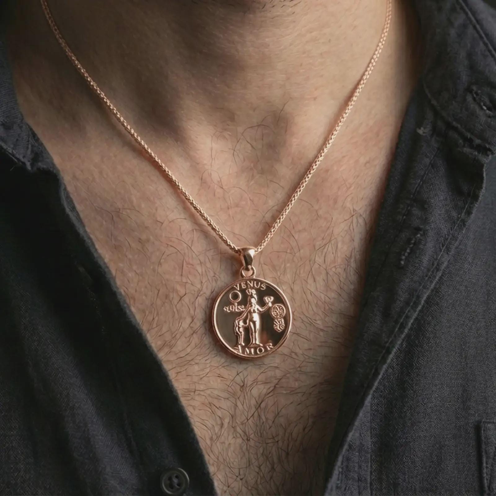 Rose gold plated Venus Amor pendant necklace worn on the neck, presented in a close-up lifestyle shot with a refined symbolic aesthetic.