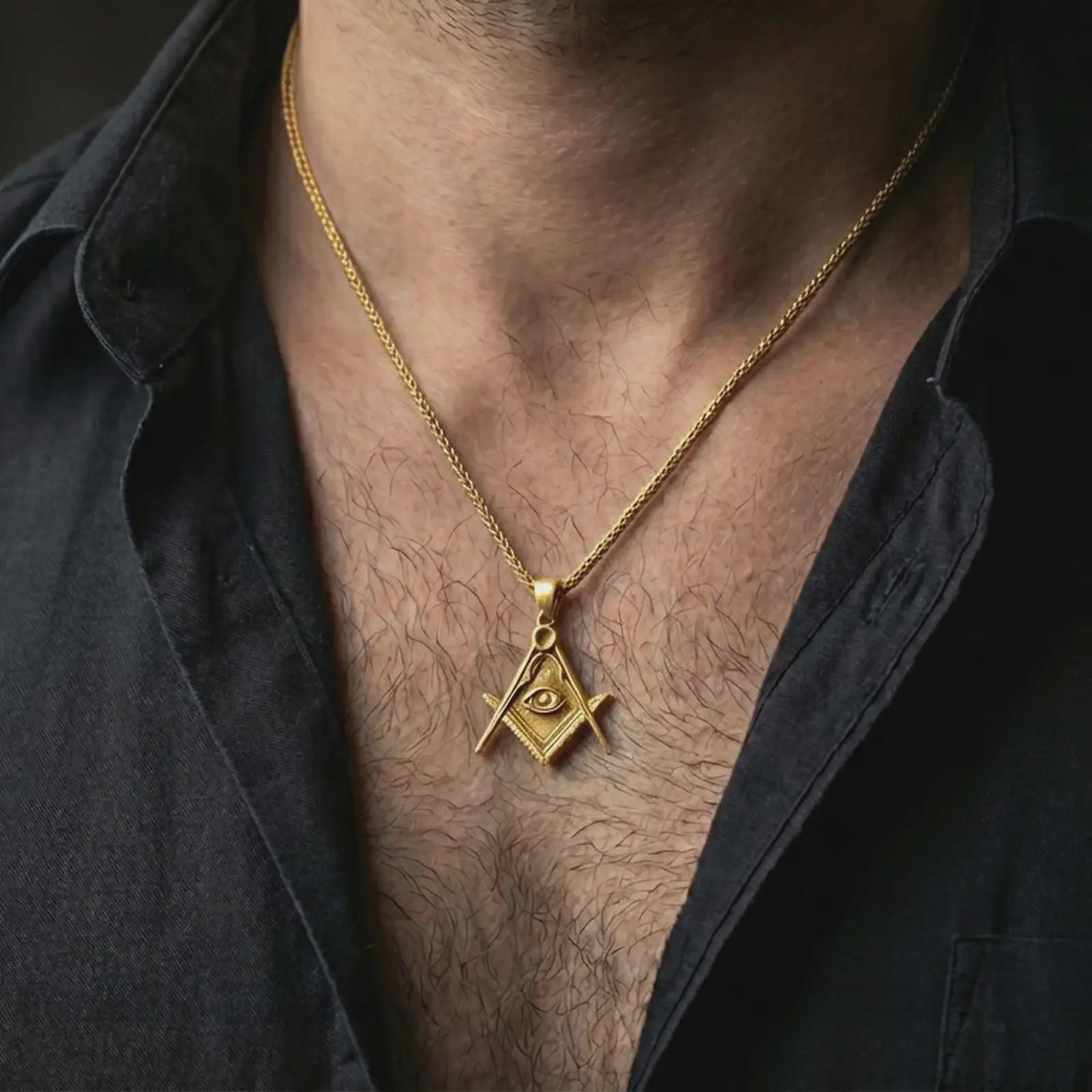Gold plated Master Mason pendant necklace worn on the neck, captured on a human model in a premium dark-toned lifestyle frame.