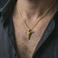 Load image into Gallery viewer, Gold plated Baphomet skull pendant necklace worn on the neck, captured on a human model in a premium dark-toned lifestyle frame.
