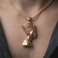 Load image into Gallery viewer, Rose gold plated Nefertiti pendant necklace worn on the neck, presented in a close-up lifestyle shot with a refined regal aesthetic.
