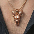 Load image into Gallery viewer, Rose gold plated rabbit skull pendant necklace worn on the neck, presented in a close-up lifestyle shot with a refined gothic aesthetic.
