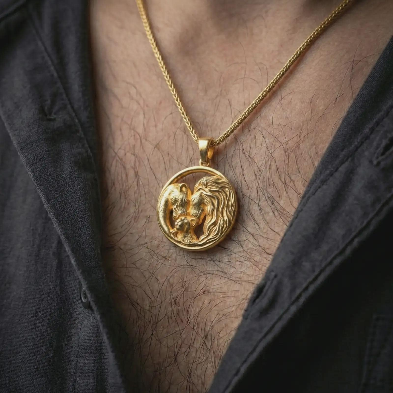 Gold plated lion and bear family pendant necklace worn on the neck, captured on a human model in a premium dark-toned lifestyle frame.