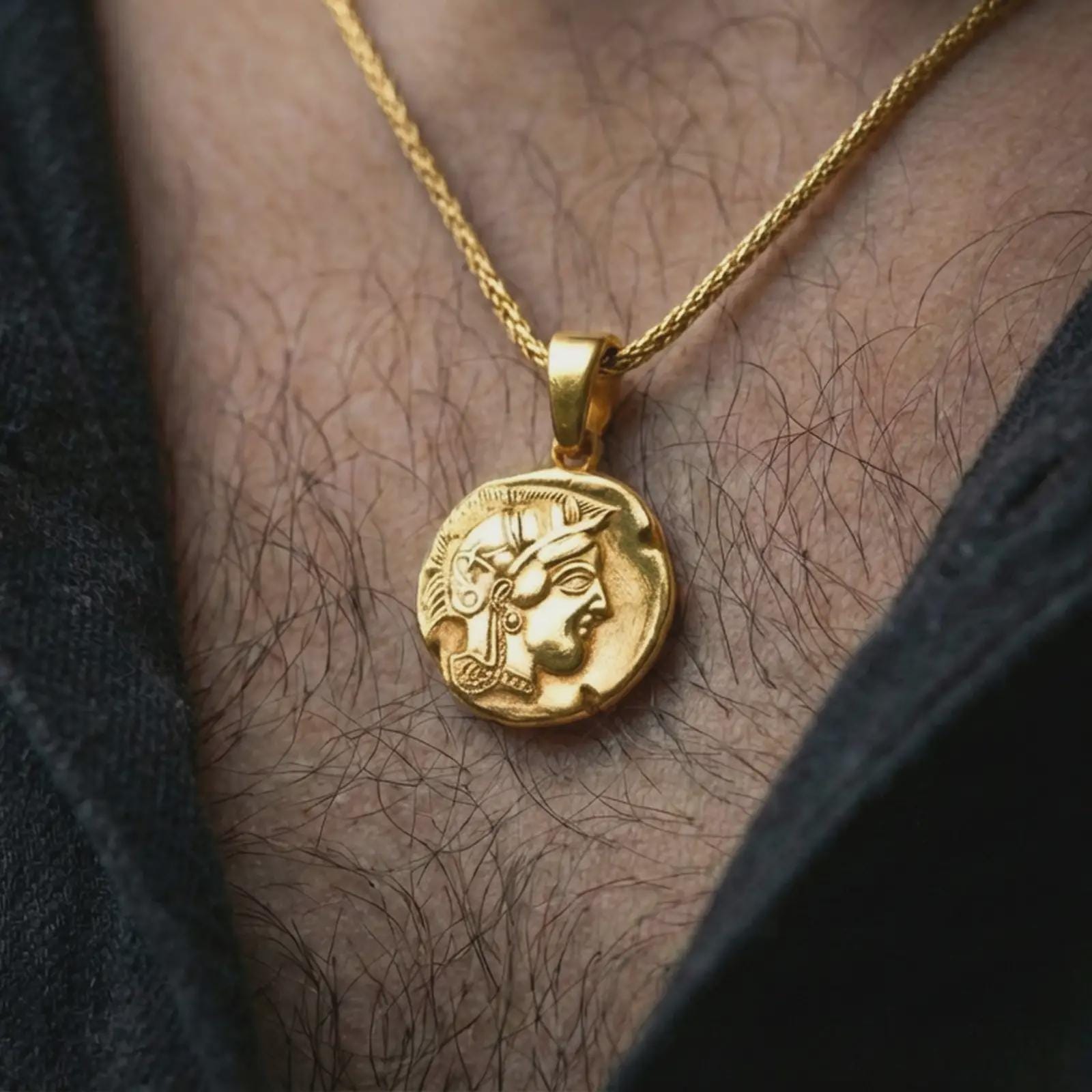 Gold plated Athena owl coin pendant necklace worn on the neck, captured in a premium lifestyle composition that highlights the wisdom symbol and heritage coin motif as a distinctive jewelry accent.