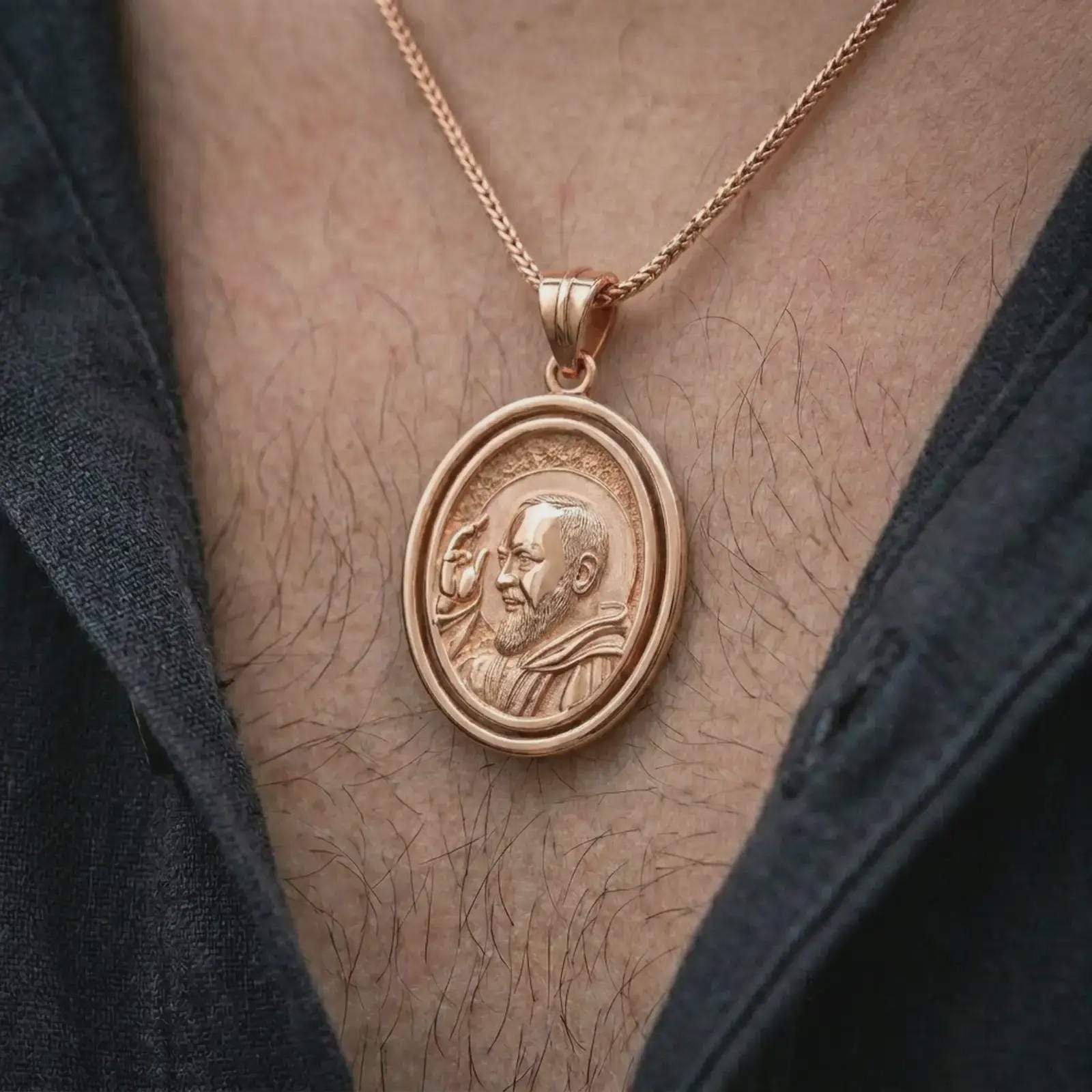 Rose gold plated Saint Padre Pio spinning pendant necklace worn on the neck, presented in an elegant model photograph with a strong Catholic aesthetic and symbolic presence.
