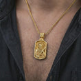 Load image into Gallery viewer, Gold plated Saint Andrew dog tag pendant necklace worn on the chest, premium lifestyle jewelry photo with the Saint Andrew dog tag medal centered on a spiga chain.
