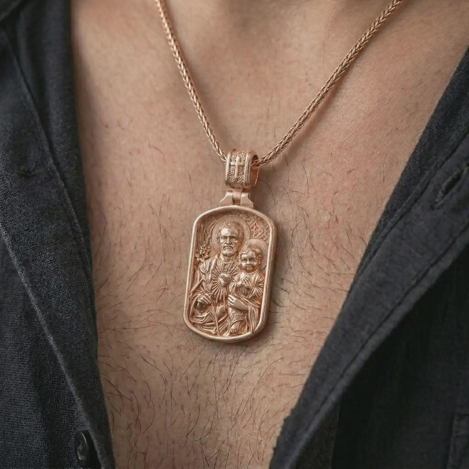 Rose gold plated Saint Joseph and Jesus pendant necklace worn on the chest, close-up lifestyle shot featuring the sacred Saint Joseph and Jesus design with warm rose gold tones.