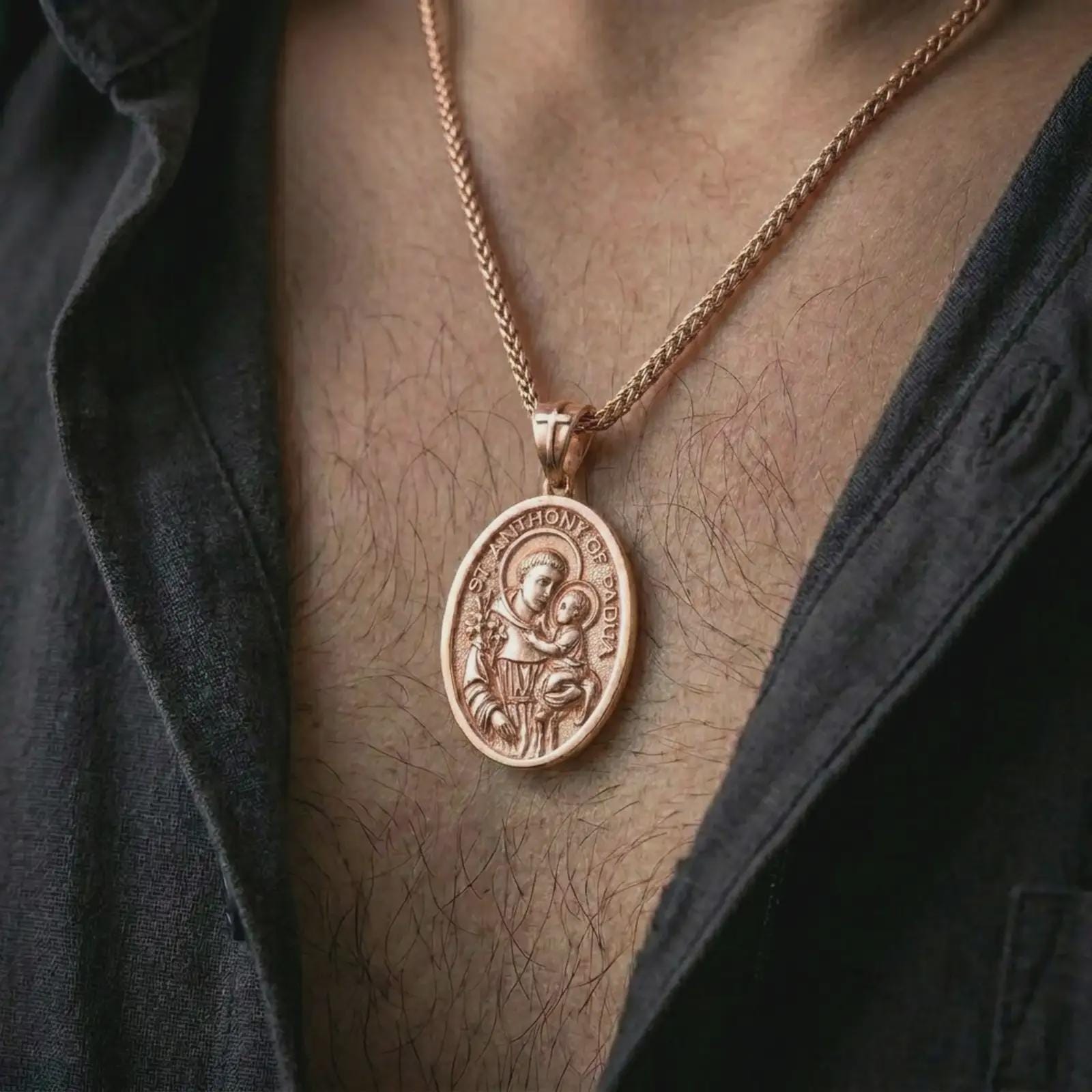 Rose gold plated Saint Anthony of Padua pendant necklace worn on the chest, close-up lifestyle shot featuring the sacred Saint Anthony of Padua design with warm rose gold tones.