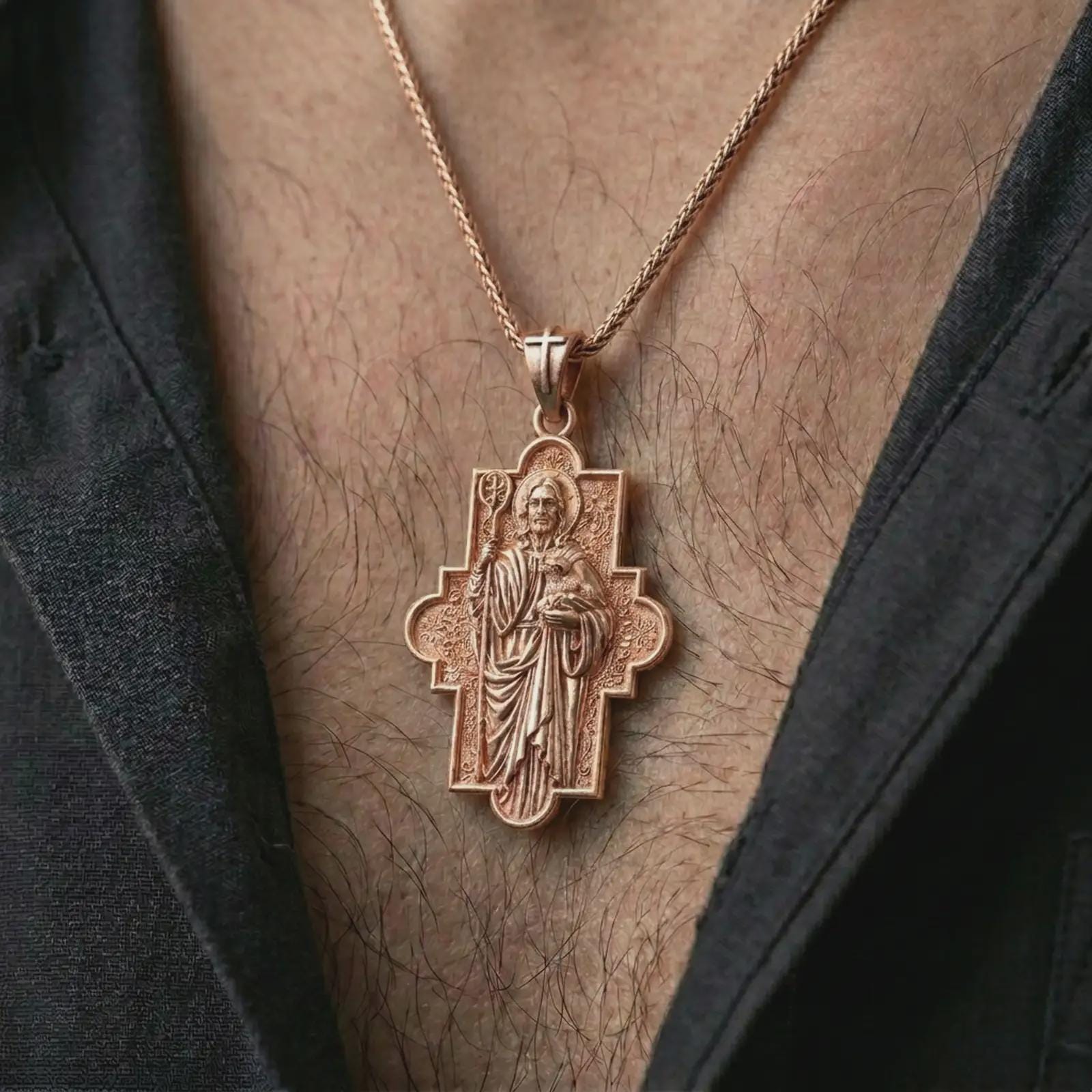 Rose gold plated Good Shepherd cross pendant necklace worn on the chest, close-up lifestyle shot featuring the sacred Good Shepherd design with warm rose gold tones.