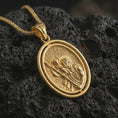 Load image into Gallery viewer, Gold plated Saint Christopher spinning pendant necklace on textured volcanic rock, premium close-up studio composition emphasizing the child Jesus, staff, and protective traveler saint symbolism.
