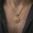Load image into Gallery viewer, Rose gold plated Viking lion medallion pendant necklace worn on the neck, presented in a close-up lifestyle shot with a refined Norse aesthetic.
