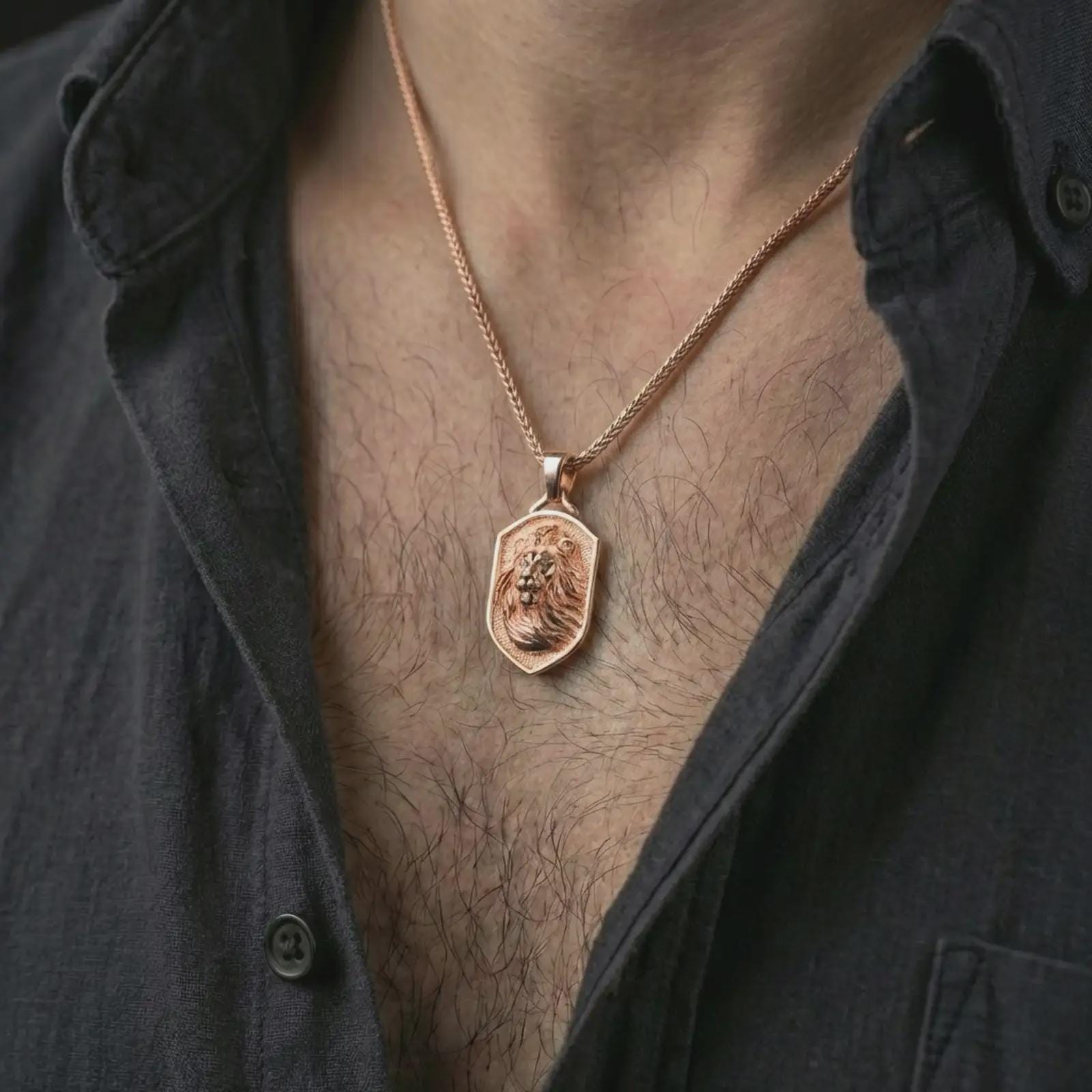 Rose gold plated lion shield pendant necklace worn on the neck, presented in a close-up lifestyle shot with a refined royal aesthetic.