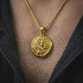 Load image into Gallery viewer, Gold plated lion medallion pendant necklace worn on the neck, captured in a premium lifestyle composition with the pendant centered on the chest.
