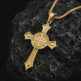 Load image into Gallery viewer, Gold plated Knights Templar cross pendant necklace presented on porous volcanic rock, photographed in a luxurious close-up view that emphasizes the heraldic cross shape and central crusader emblem.

