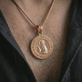 Load image into Gallery viewer, Rose gold plated Saint Xenia pendant necklace worn on the neck, shown in an elegant model photograph with a sacred and devotional Orthodox jewelry look.
