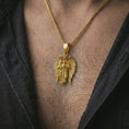Load image into Gallery viewer, Gold plated angel warrior pendant necklace worn on the neck, captured in an elegant lifestyle composition that highlights the celestial warrior motif as a meaningful Christian statement piece.
