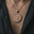 Load image into Gallery viewer, Rose gold plated Manipura chakra pendant necklace worn on the chest, close-up lifestyle shot featuring the solar plexus chakra design with warm rose gold tones.
