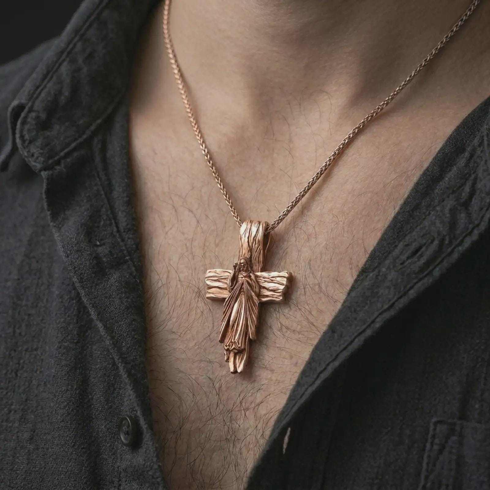 Rose gold plated Jesus cross pendant necklace worn on the chest, close-up lifestyle shot featuring the sacred Jesus cross design with warm rose gold tones.