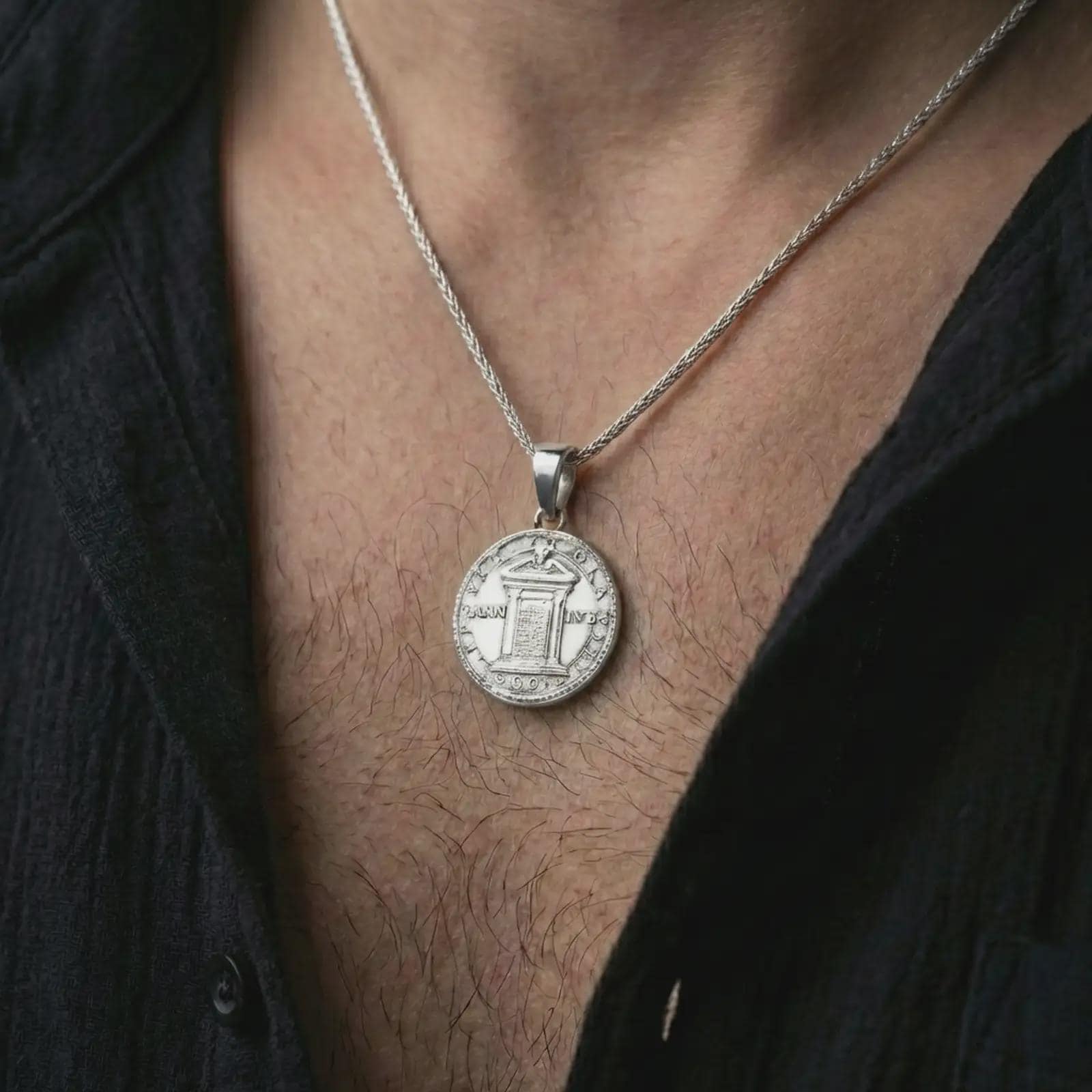 Polished silver Pope Innocent coin pendant necklace worn on the neck, shown in a clean model shot with the round papal portrait pendant centered for a refined heritage-inspired look.