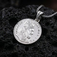 Load image into Gallery viewer, Polished silver Pope Innocent coin pendant necklace displayed on dark volcanic rock, shown in a premium close-up image that highlights the crowned papal bust and historical medal engraving.

