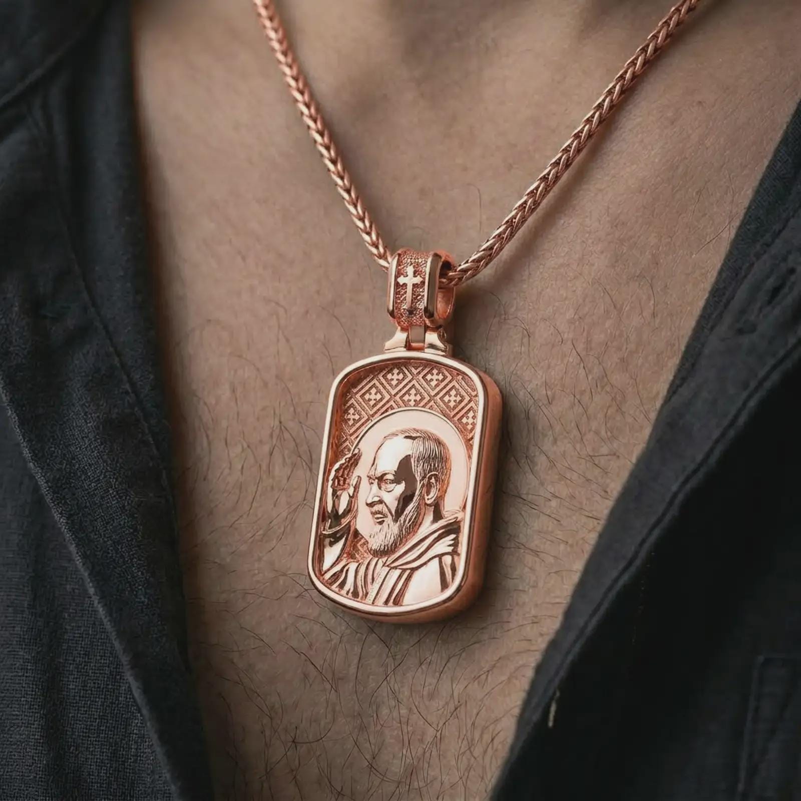 Rose gold plated Saint Padre Pio dog tag pendant necklace worn on the chest, close-up lifestyle shot featuring the sacred Saint Padre Pio design with warm rose gold tones.