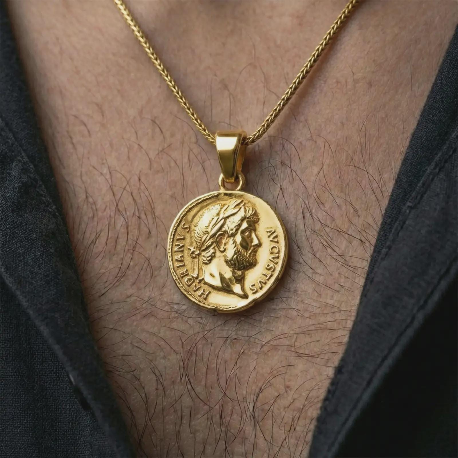 Gold plated Emperor Augustus coin pendant necklace worn on the neck, captured in a premium lifestyle composition that highlights the antique imperial coin motif as a distinctive heritage jewelry accent.