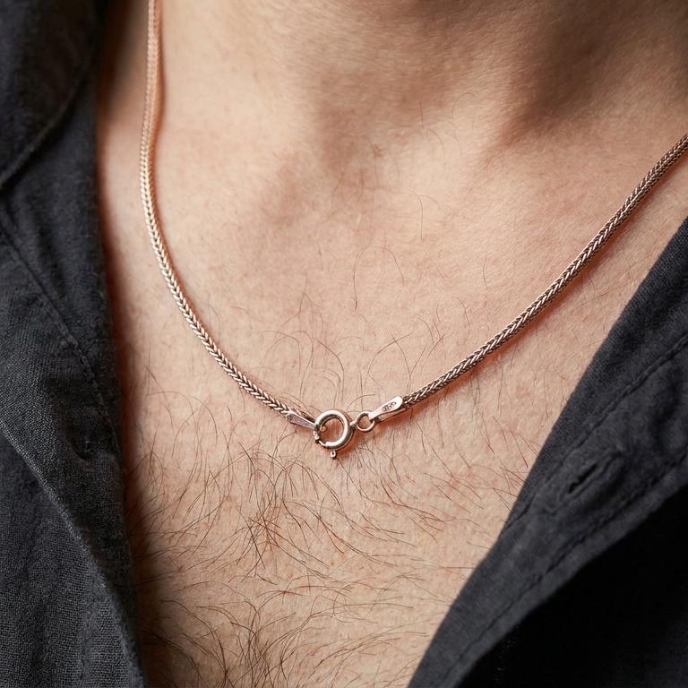 Rose gold plated Italian foxtail chain necklace worn on the chest, close-up lifestyle shot featuring the warm rose gold tone and refined foxtail chain texture.