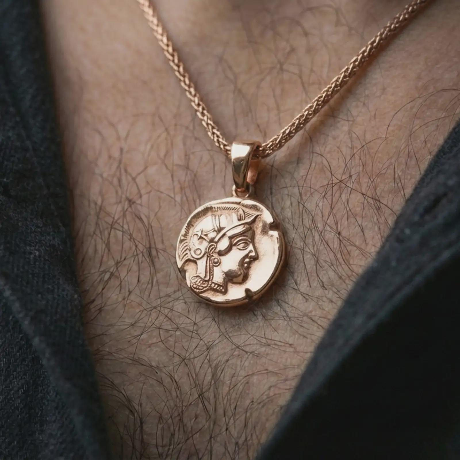 Rose gold plated Athena owl coin pendant necklace worn on the neck, presented in an elegant model photograph with a timeless Greek mythology and collector-inspired aesthetic.