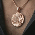 Load image into Gallery viewer, Rose gold plated ancient Greek coin pendant necklace worn on the neck, presented in an elegant model photograph with a timeless Greek history and collector-inspired aesthetic.
