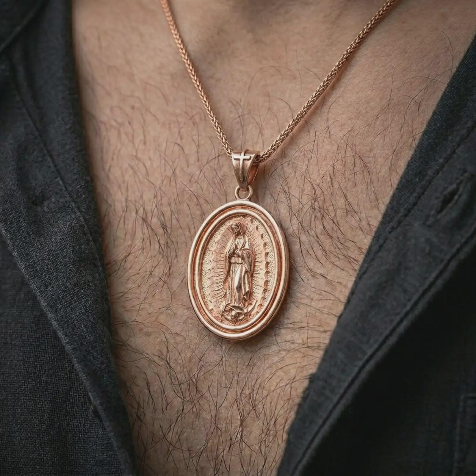 Rose gold plated Our Lady of Guadalupe spinner pendant necklace worn on the chest, close-up lifestyle shot featuring the sacred Our Lady of Guadalupe design with warm rose gold tones.
