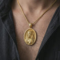 Load image into Gallery viewer, Gold plated Jesus Christ Good Shepherd pendant necklace worn on the chest, premium lifestyle jewelry photo with the Good Shepherd medal centered on a spiga chain.
