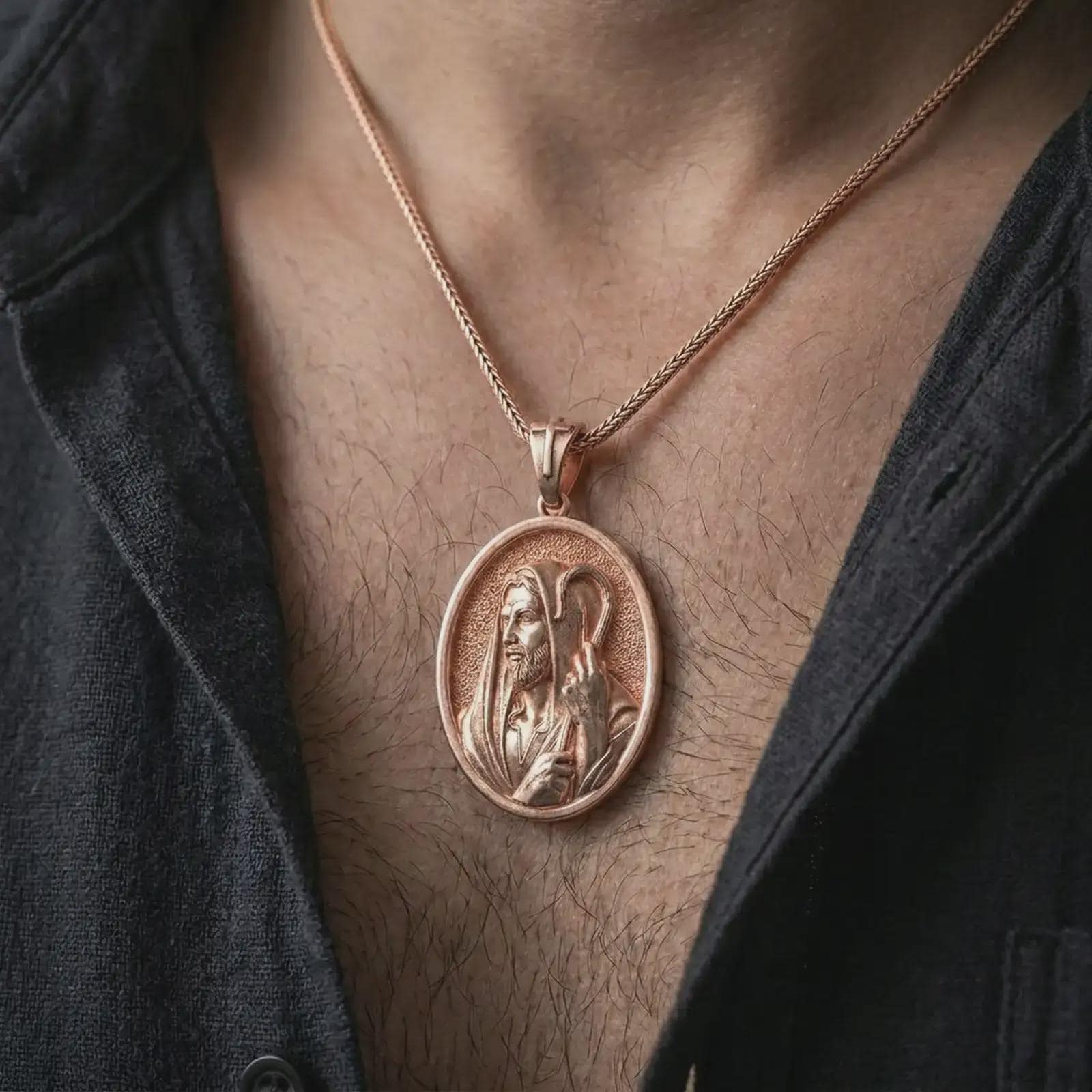 Rose gold plated Jesus Christ Good Shepherd pendant necklace worn on the chest, close-up lifestyle shot featuring the sacred Jesus Christ Good Shepherd design with warm rose gold tones.