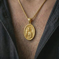 Load image into Gallery viewer, Gold plated Saint Barbara pendant necklace worn on the chest, premium lifestyle jewelry photo with the Saint Barbara medal centered on a spiga chain.
