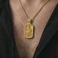 Load image into Gallery viewer, Gold plated Saint Roch dog tag pendant necklace worn on the chest, premium lifestyle jewelry photo with the Saint Roch dog tag medal centered on a spiga chain.
