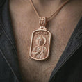 Load image into Gallery viewer, Rose gold plated Saint Jude dog tag pendant necklace worn on the chest, close-up lifestyle shot featuring the sacred Saint Jude design with warm rose gold tones.
