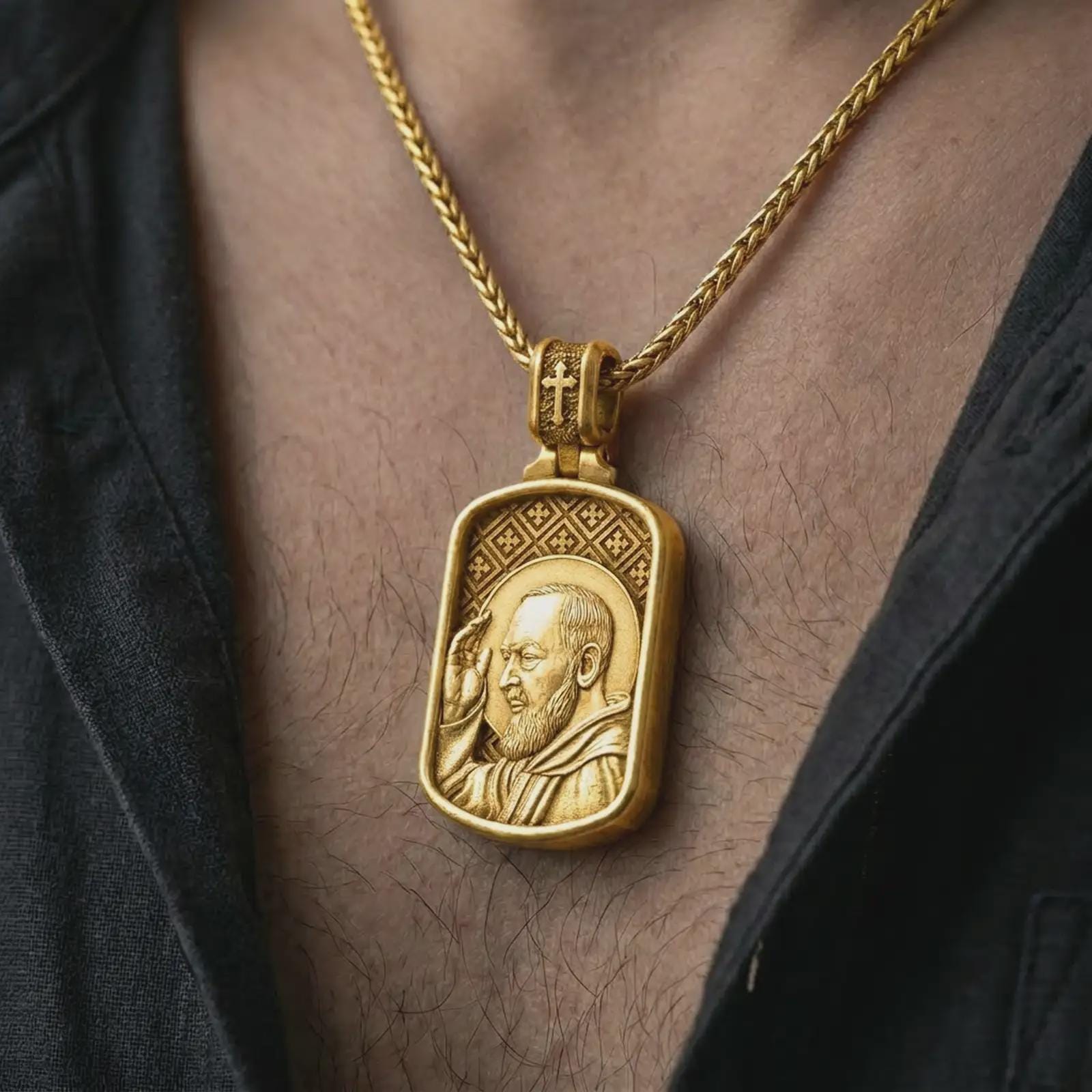 Gold plated Saint Padre Pio dog tag pendant necklace worn on the chest, premium lifestyle jewelry photo with the Saint Padre Pio medal centered on a spiga chain.