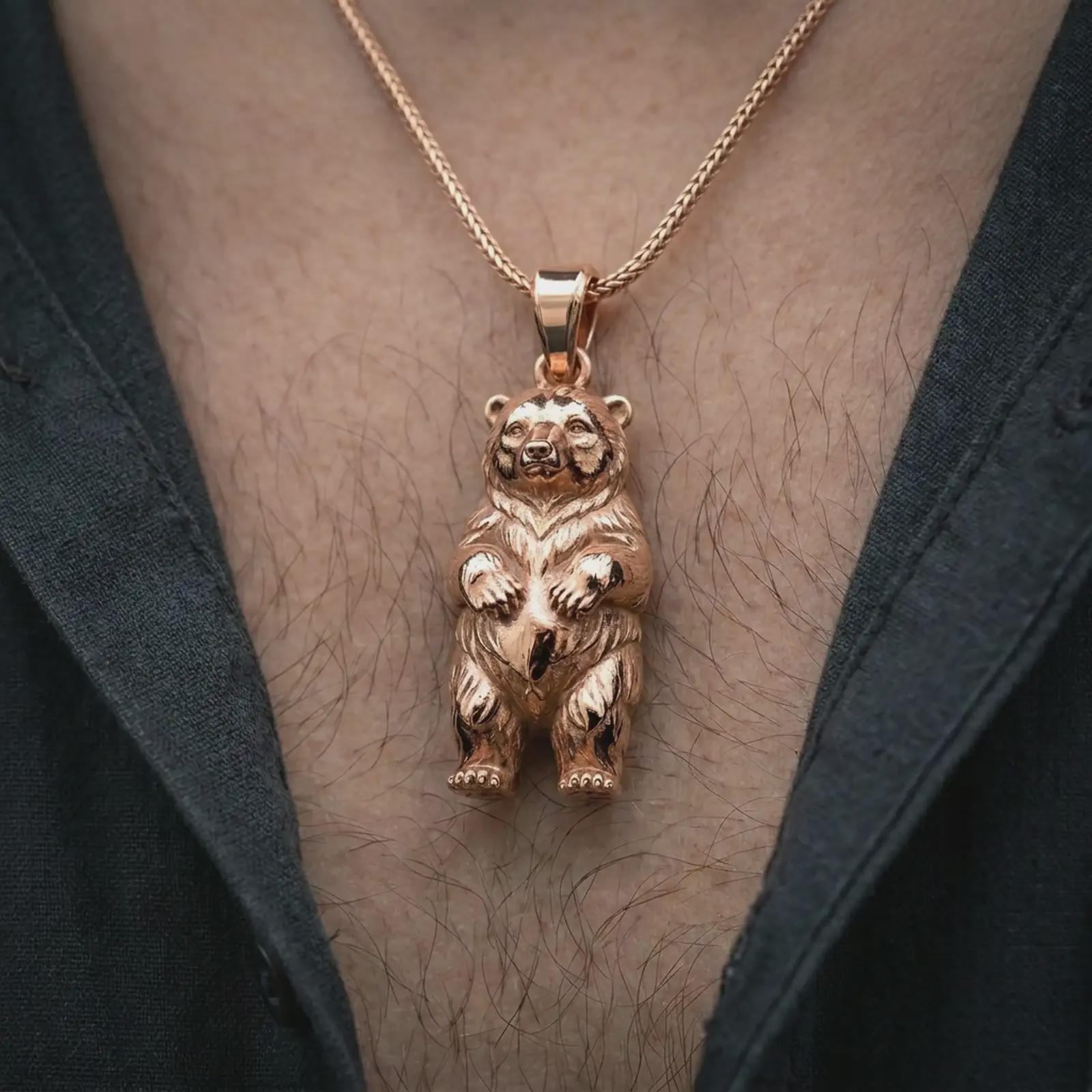 Rose gold plated baby bear pendant necklace worn on the chest, close-up lifestyle shot featuring the adorable baby bear charm with warm rose gold tones.