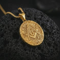 Load image into Gallery viewer, Rose gold plated Masonic square and compass pendant necklace on textured volcanic rock, detailed macro product shot with soft warm reflections and ornate Freemason symbolism.

