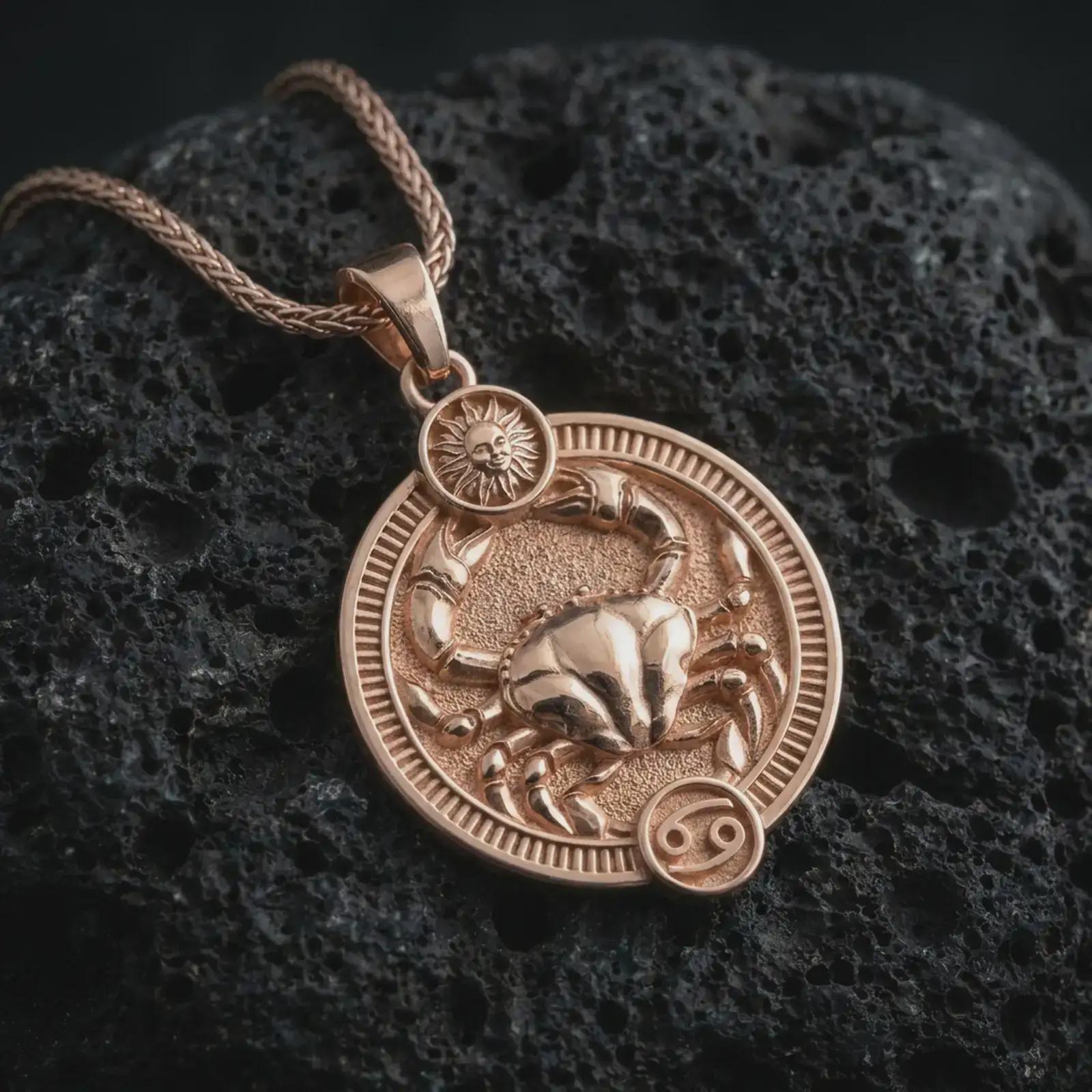 Rose gold plated Cancer zodiac pendant necklace on textured volcanic rock, detailed macro product shot with soft warm reflections and symbolic zodiac styling.