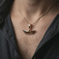 Load image into Gallery viewer, Rose gold plated origami boat pendant necklace worn on the chest, close-up lifestyle shot featuring the modern origami boat design with warm rose gold tones.
