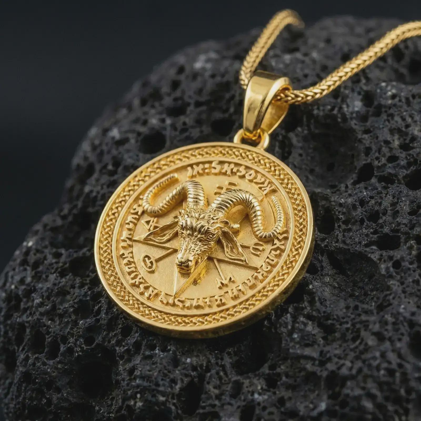 Gold plated Baphomet pendant necklace on textured volcanic rock, premium close-up studio composition emphasizing the Goat of Mendes design, pentagram motif, and dark occult medallion style.