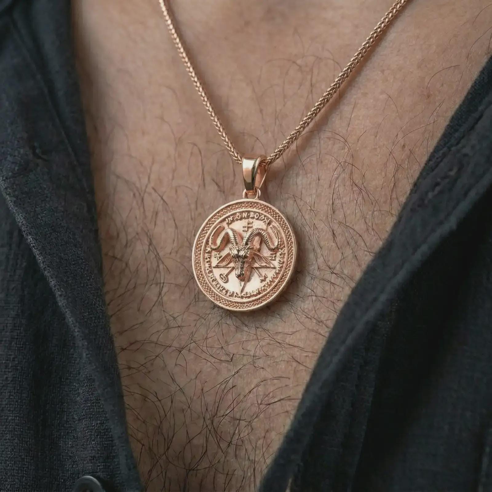 Rose gold plated Baphomet pendant necklace worn on the chest, close-up lifestyle shot featuring the dark Baphomet design with warm rose gold tones.