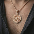 Load image into Gallery viewer, Rose gold plated Scorpio zodiac pendant necklace worn on the chest, close-up lifestyle shot featuring the intense Scorpio zodiac design with warm rose gold tones.
