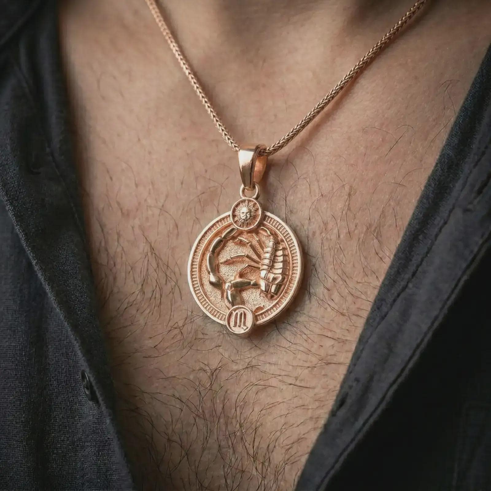 Rose gold plated Scorpio zodiac pendant necklace worn on the chest, close-up lifestyle shot featuring the intense Scorpio zodiac design with warm rose gold tones.