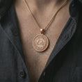 Load image into Gallery viewer, Rose gold plated all-seeing eye pendant necklace worn on the chest, close-up lifestyle shot featuring the mystical all-seeing eye design with warm rose gold tones.
