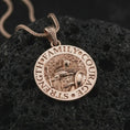 Load image into Gallery viewer, Rose gold plated Spartan warrior pendant necklace on textured volcanic rock, detailed macro product shot with soft warm reflections and heroic warrior symbolism.
