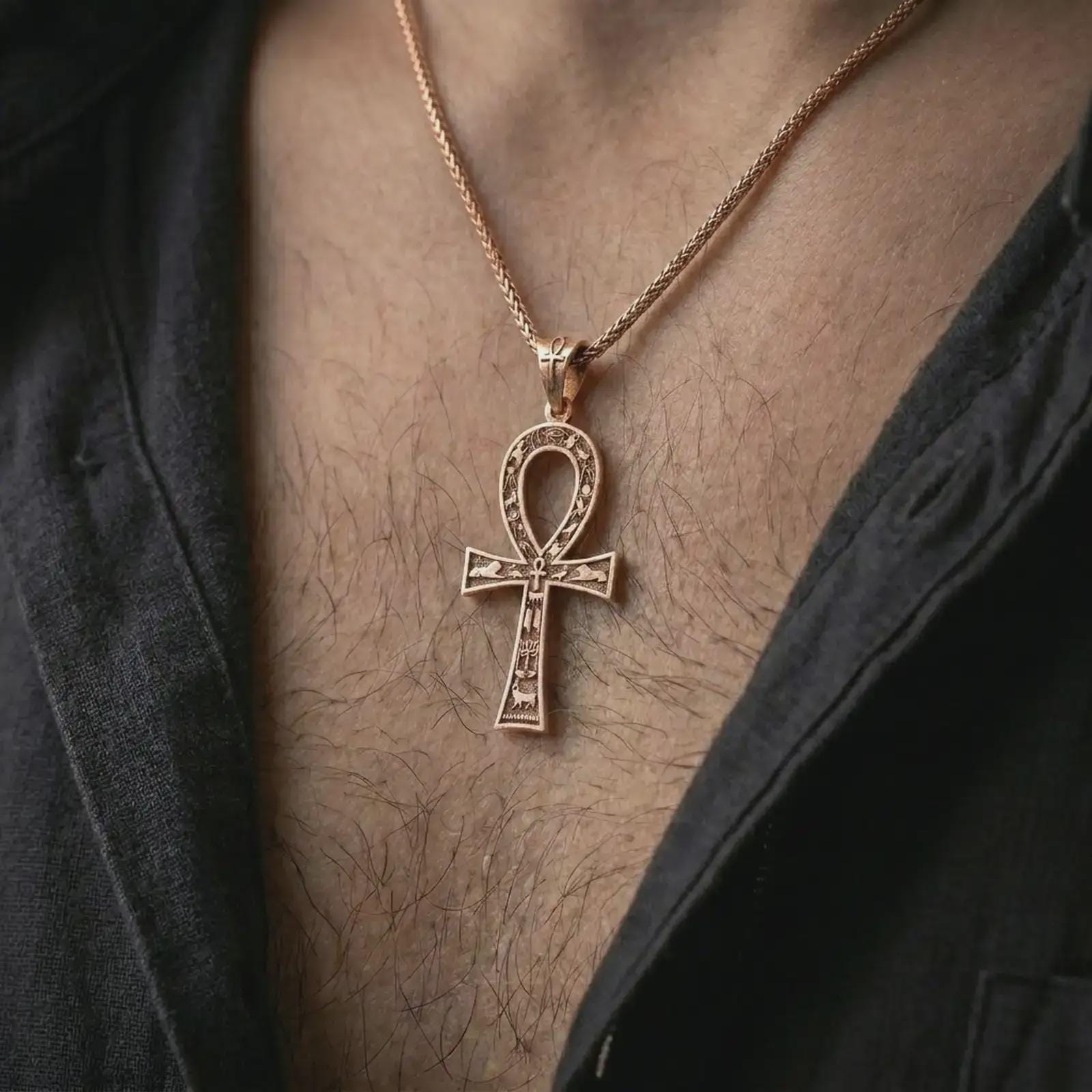 Rose gold plated ankh cross pendant necklace worn on the chest, close-up lifestyle shot featuring the ancient key of life design with warm rose gold tones.