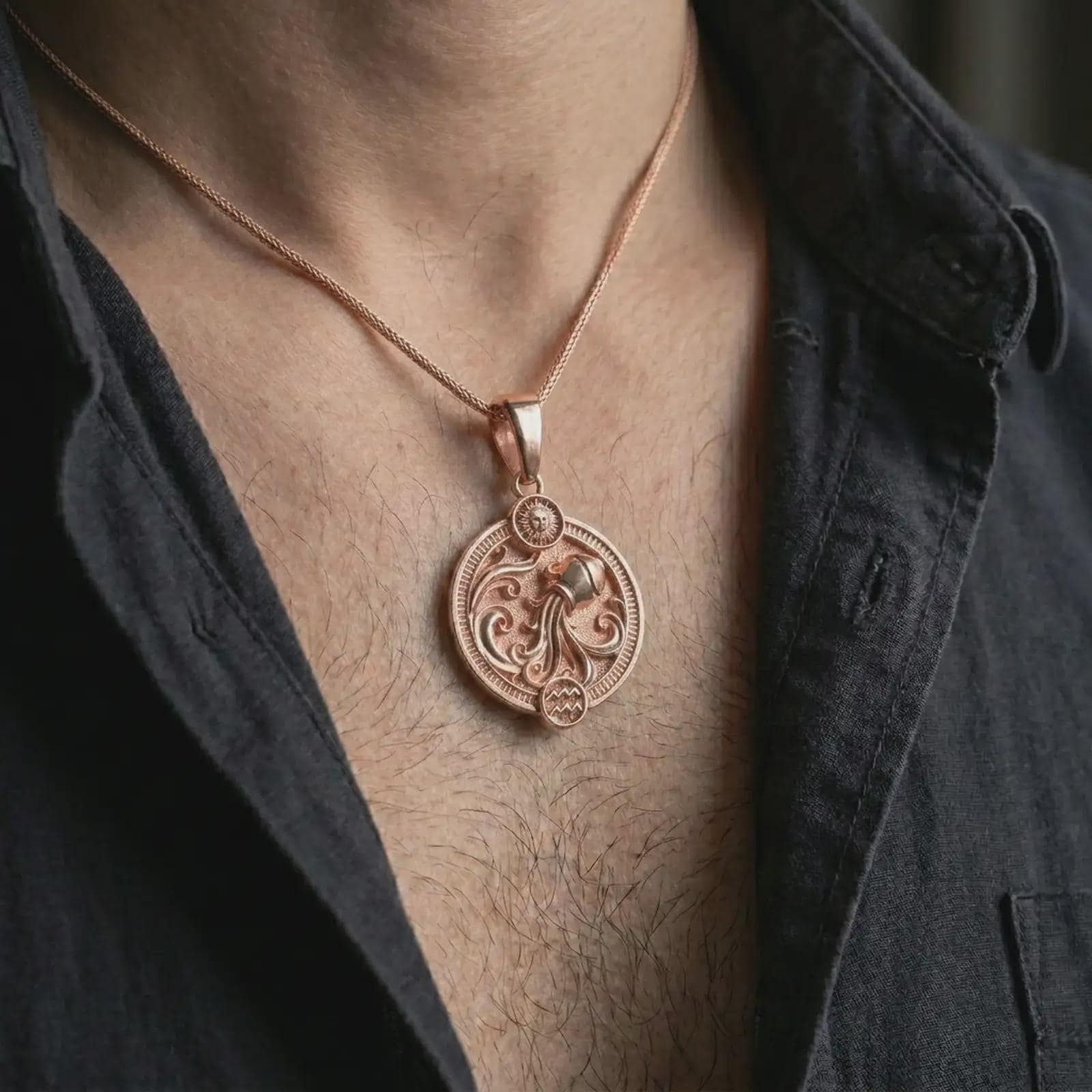Rose gold plated Aquarius zodiac pendant necklace worn on the chest, close-up lifestyle shot featuring the flowing Aquarius zodiac design with warm rose gold tones.
