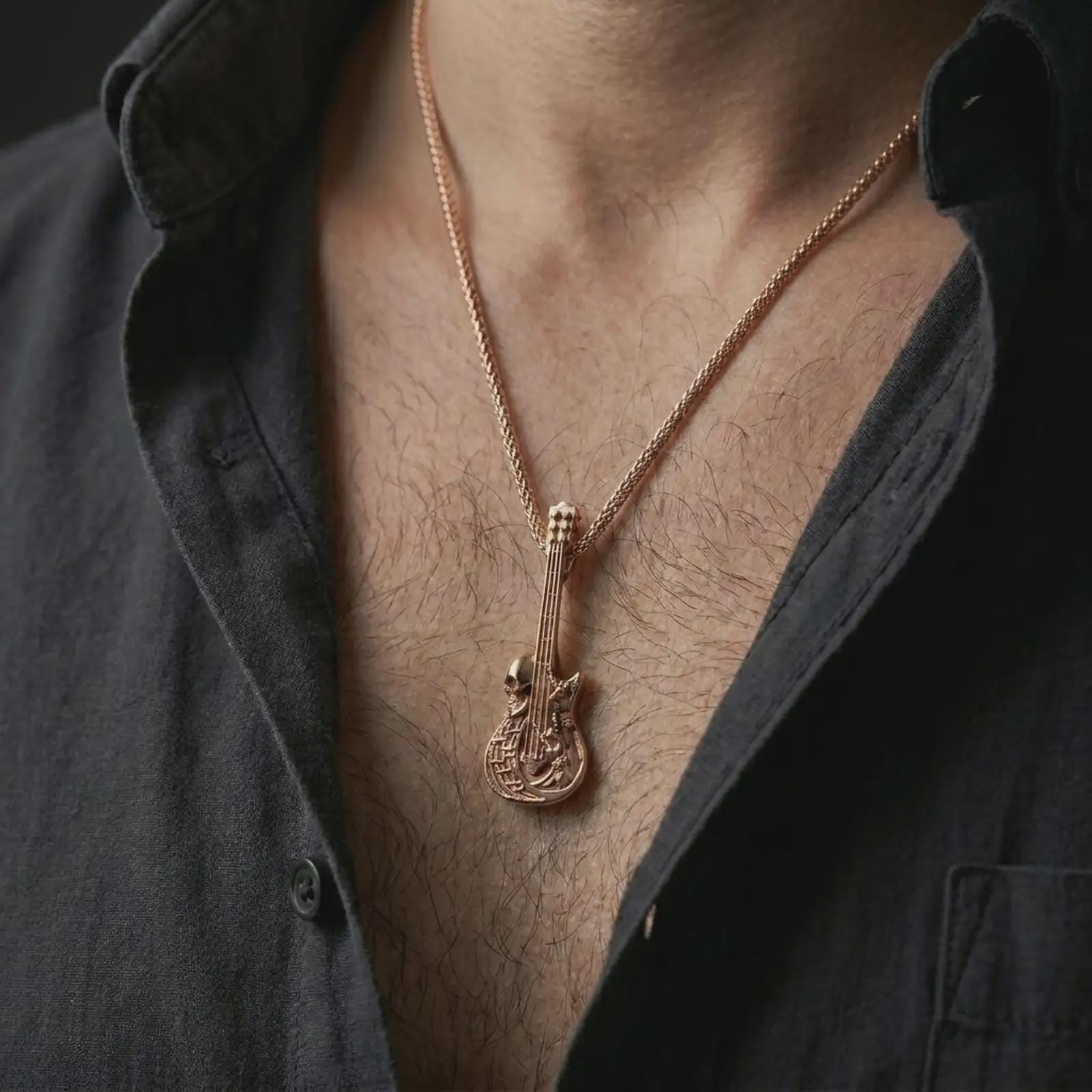 Rose gold plated skull guitar pendant necklace worn on the chest, close-up lifestyle shot featuring the rock and roll guitar design with warm rose gold tones.