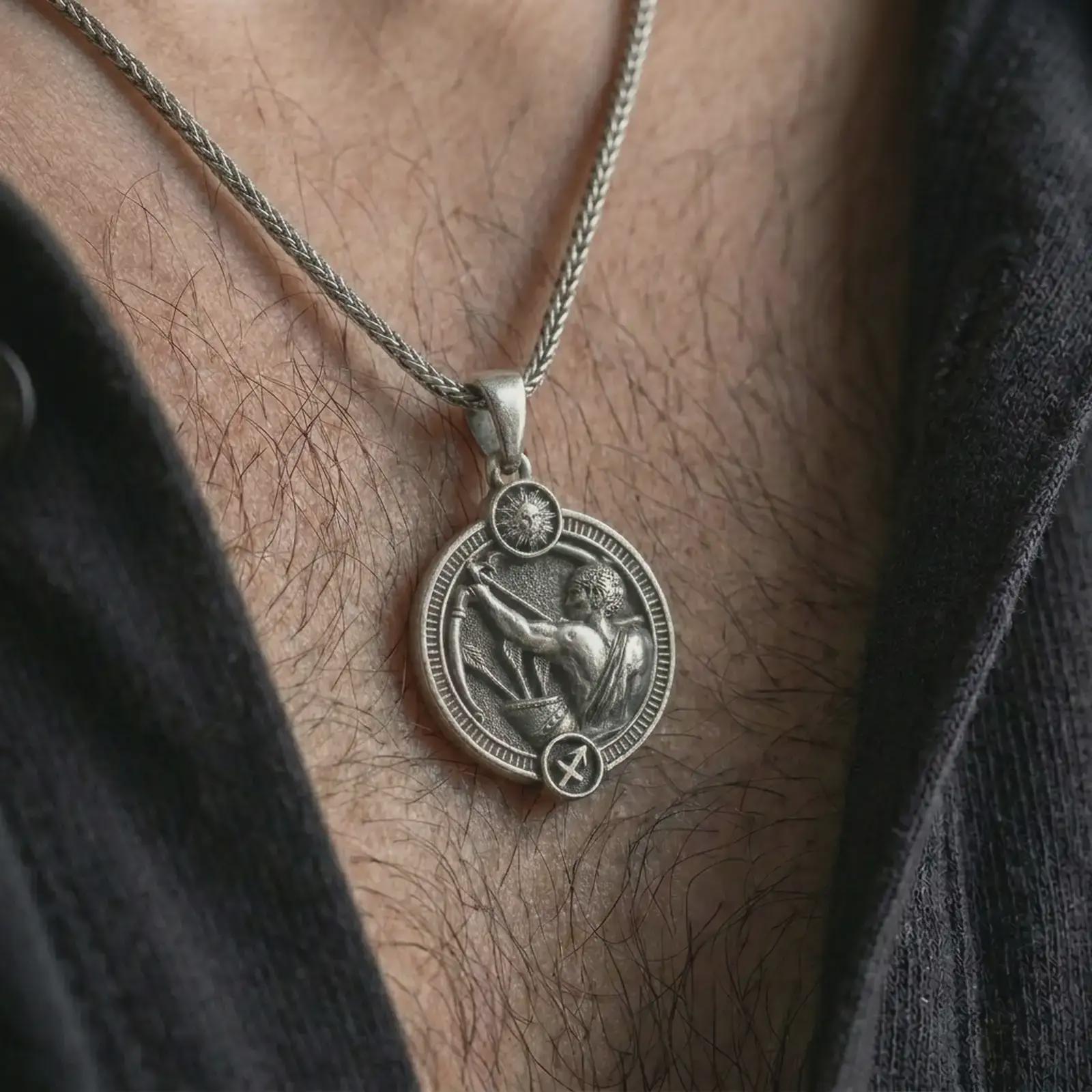 Oxidized Sagittarius zodiac pendant necklace worn on the chest, close-up lifestyle jewelry photo showing the archer astrology medallion on a spiga chain with dark clothing.